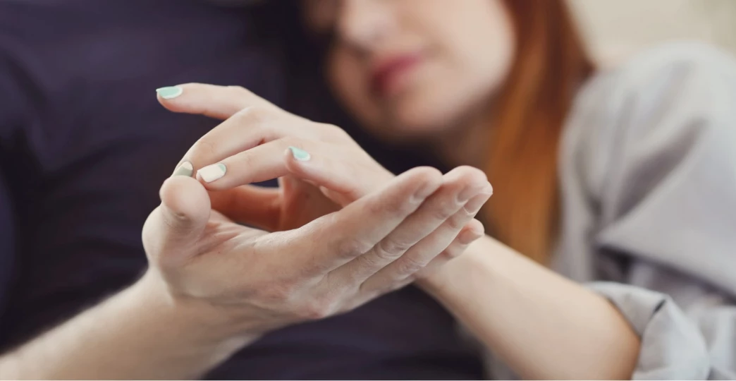 woman feeling secure sitting next to husband