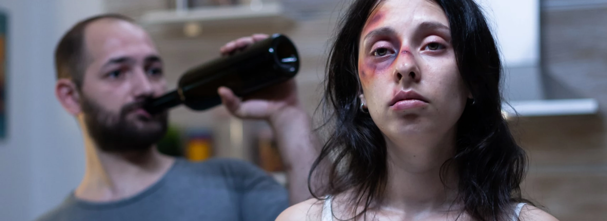 Panicked helpless woman with bruised face after domestic violence
