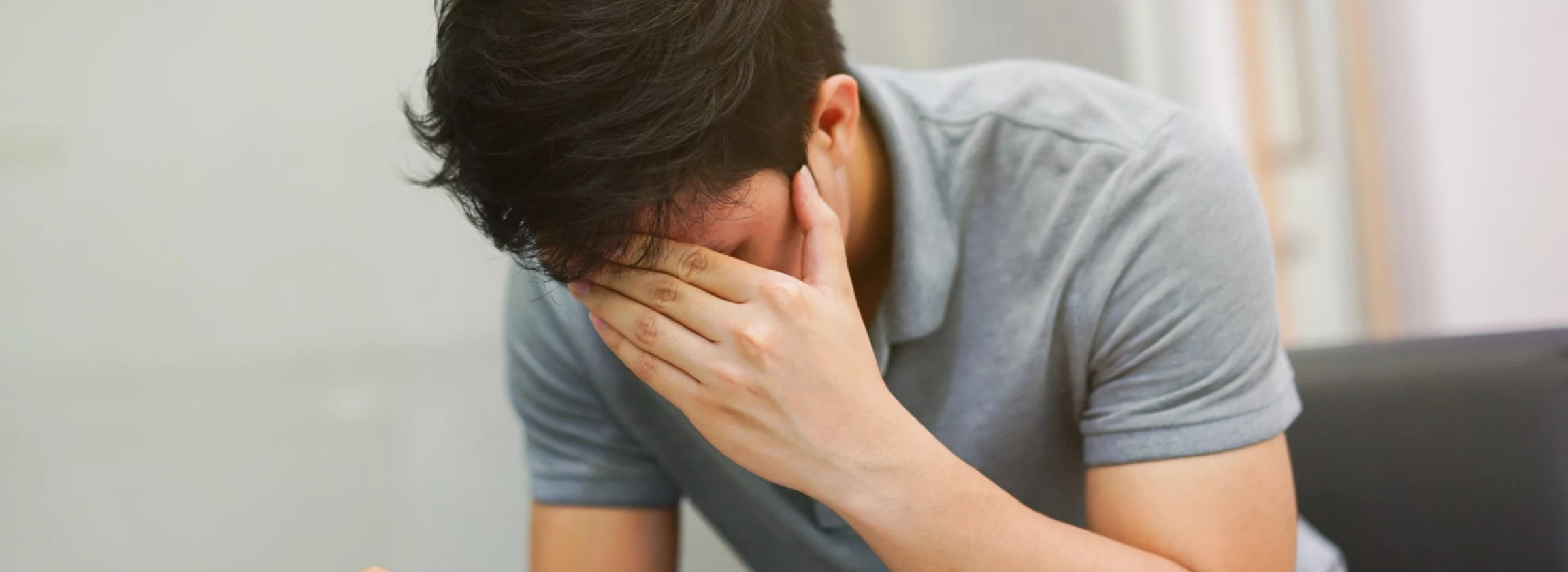 Close up young man stress with working job at laptop desk