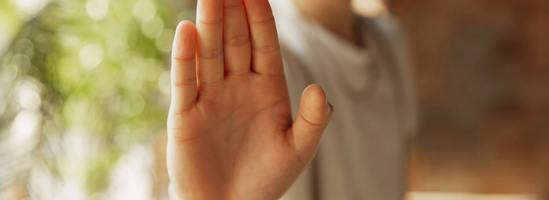 close up of male hand showing sign of stoping rejectioning