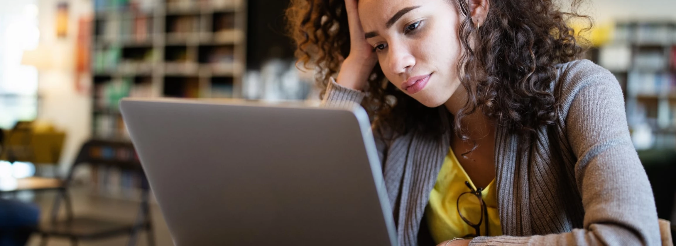 student woman finding it difficult at study and comprehend school tasks