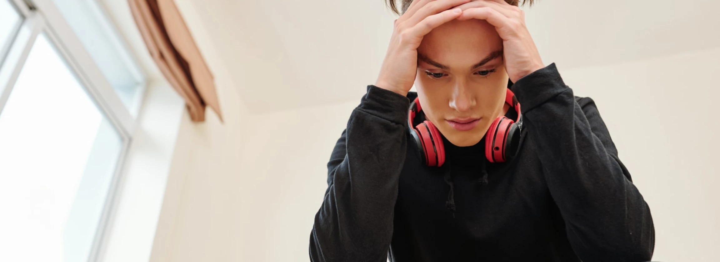 stressed teenager thinking about his actions