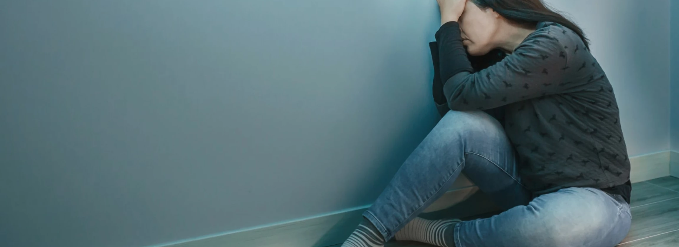 unrecognizable woman with anxiety disorder with hands in head