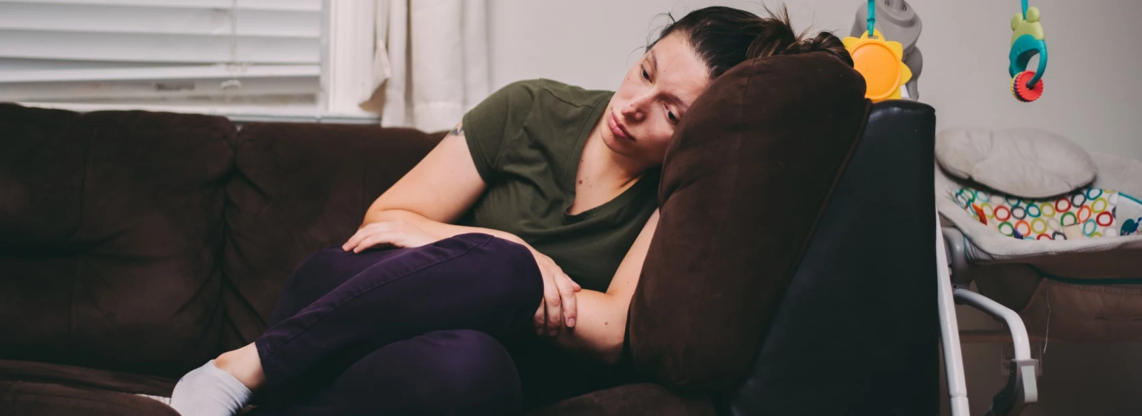 a mother who is feeling lonely tired and sad