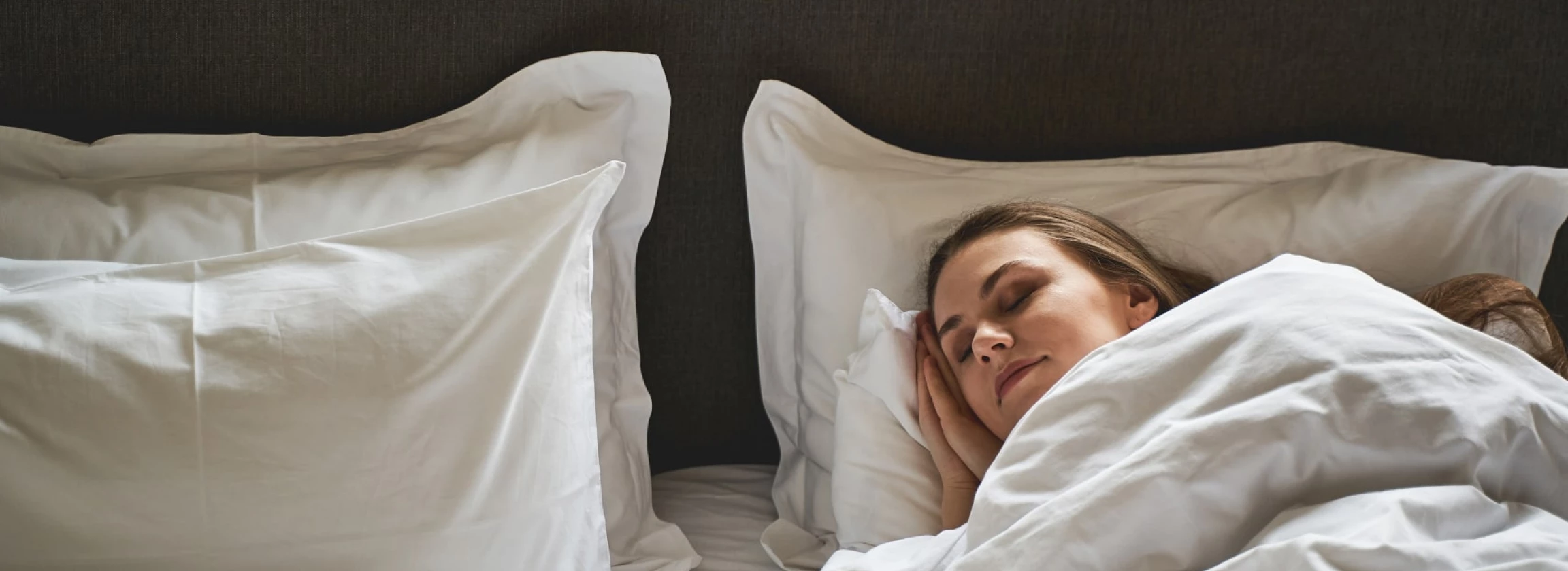 modern tranquil pretty young lady sleeping peacefully