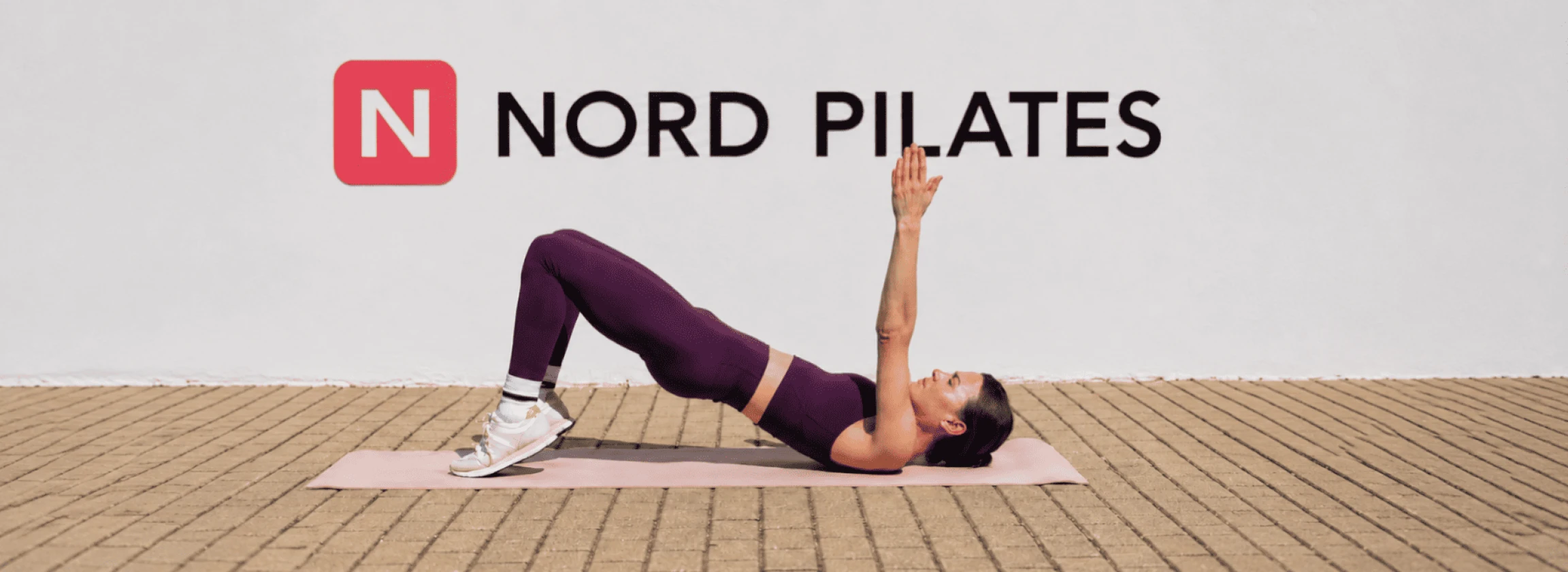 nord pilates logo and girl working out