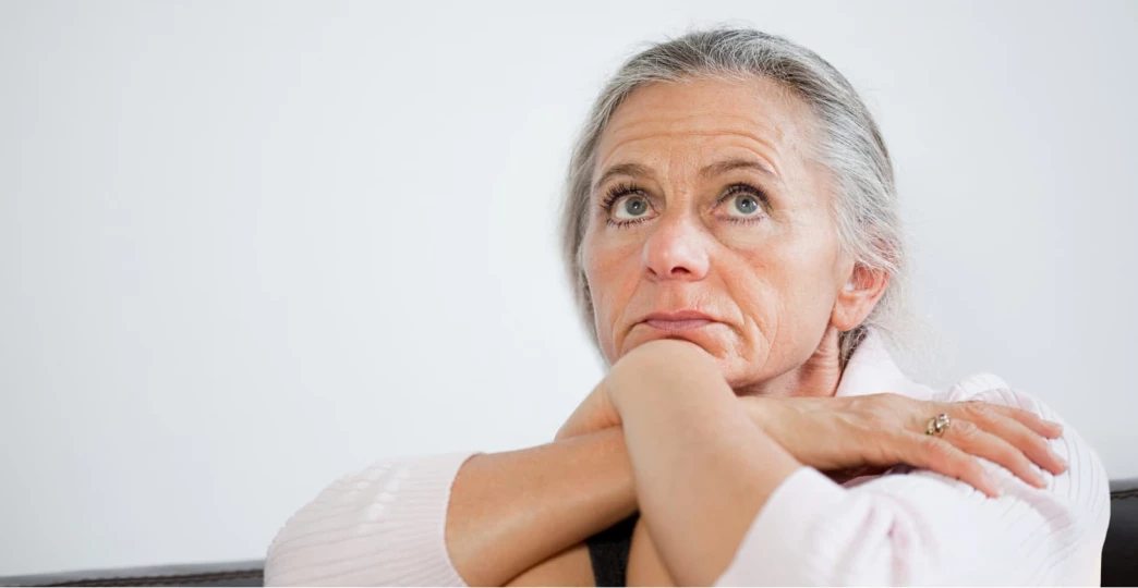 mature woman looking anxious