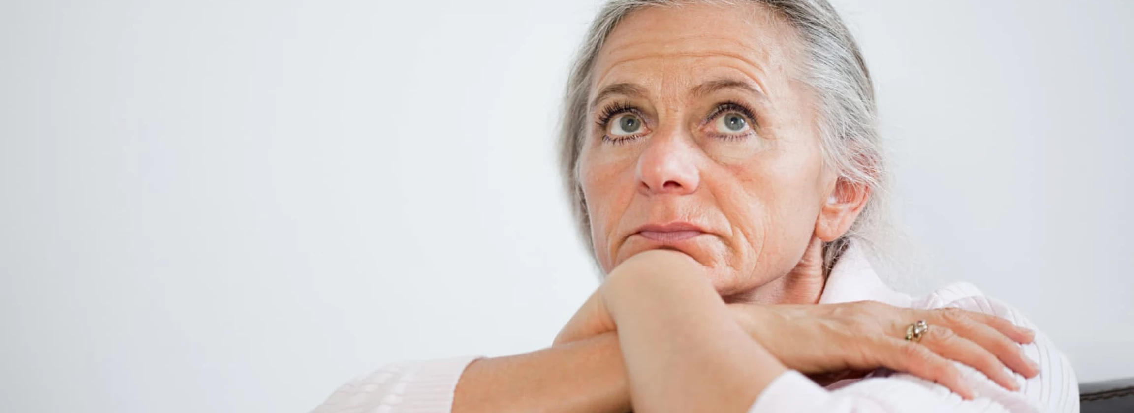 mature woman looking anxious