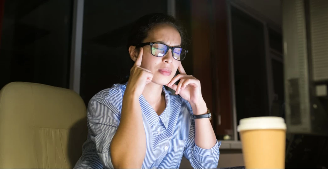 stressed woman working at night