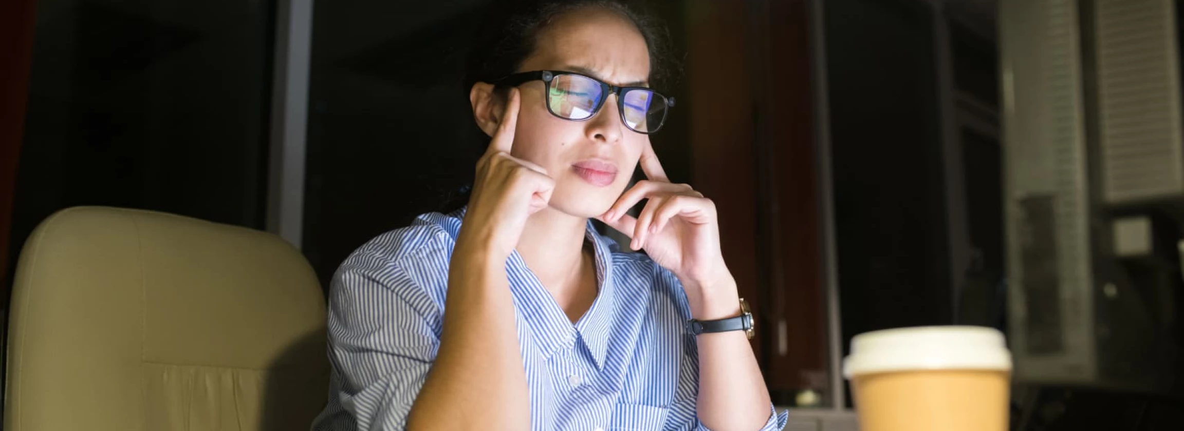 stressed woman working at night