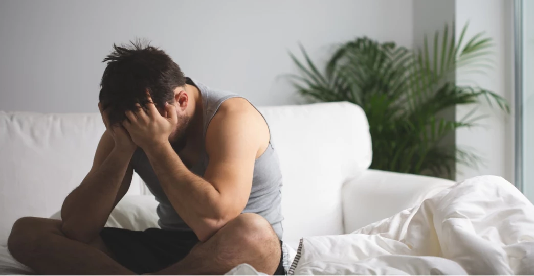 man suffering from insomnia