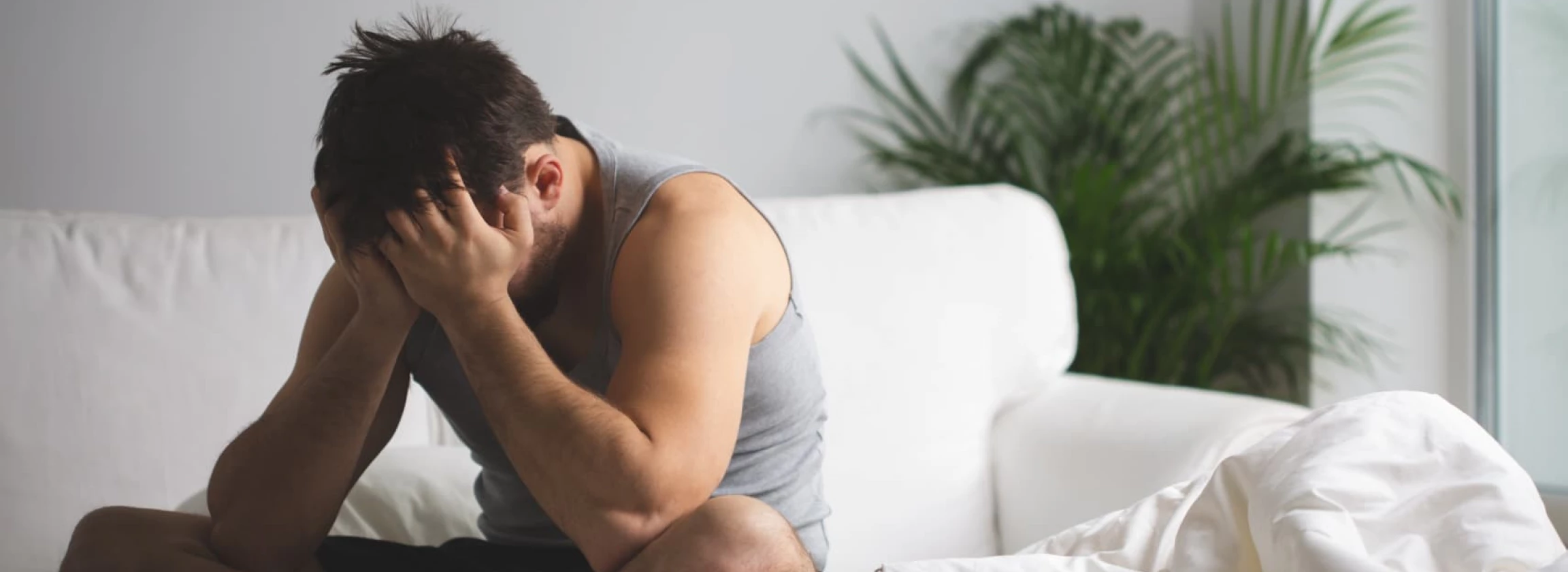 man suffering from insomnia