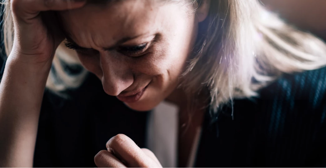fear and anxiety female face expressing strong negative emotions
