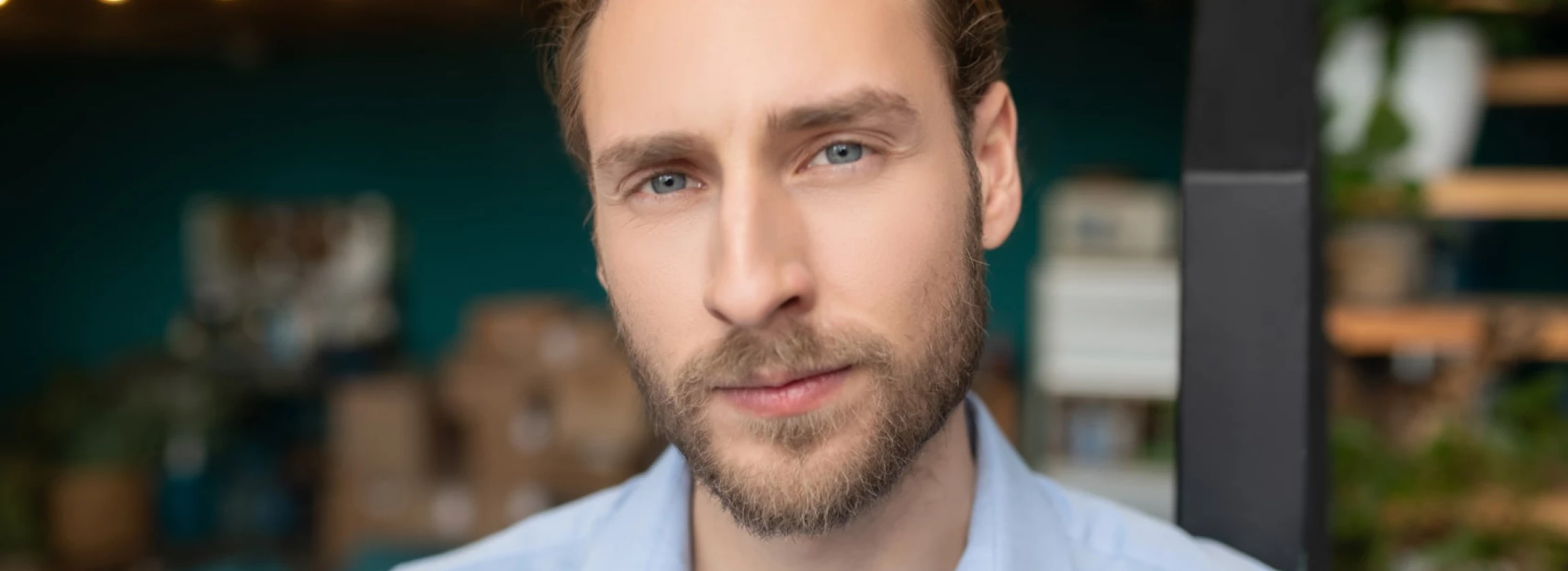 1-handsome-gray-eyed-man-wearing-shirt-feeling-self-confidence